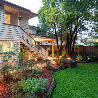 Lovely backyard garden and lawn on old Queenslander property
